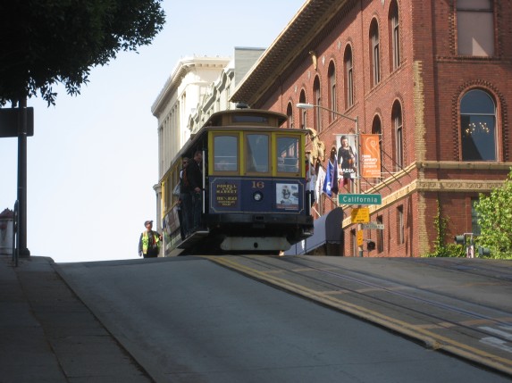 © 2012 S. D. Stewart, Cable car cresting Powell Street into Lower Nob Hill, San Francisco, California